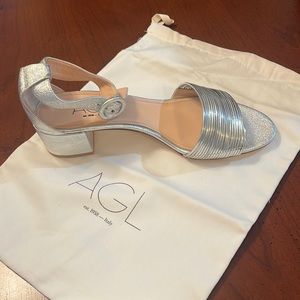 Silver, sparkly heels that are brand new and have never been worn!!! size 10.5